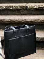 Waterproof vegan leather tote bag with organised interior, ideal for professionals on the go
