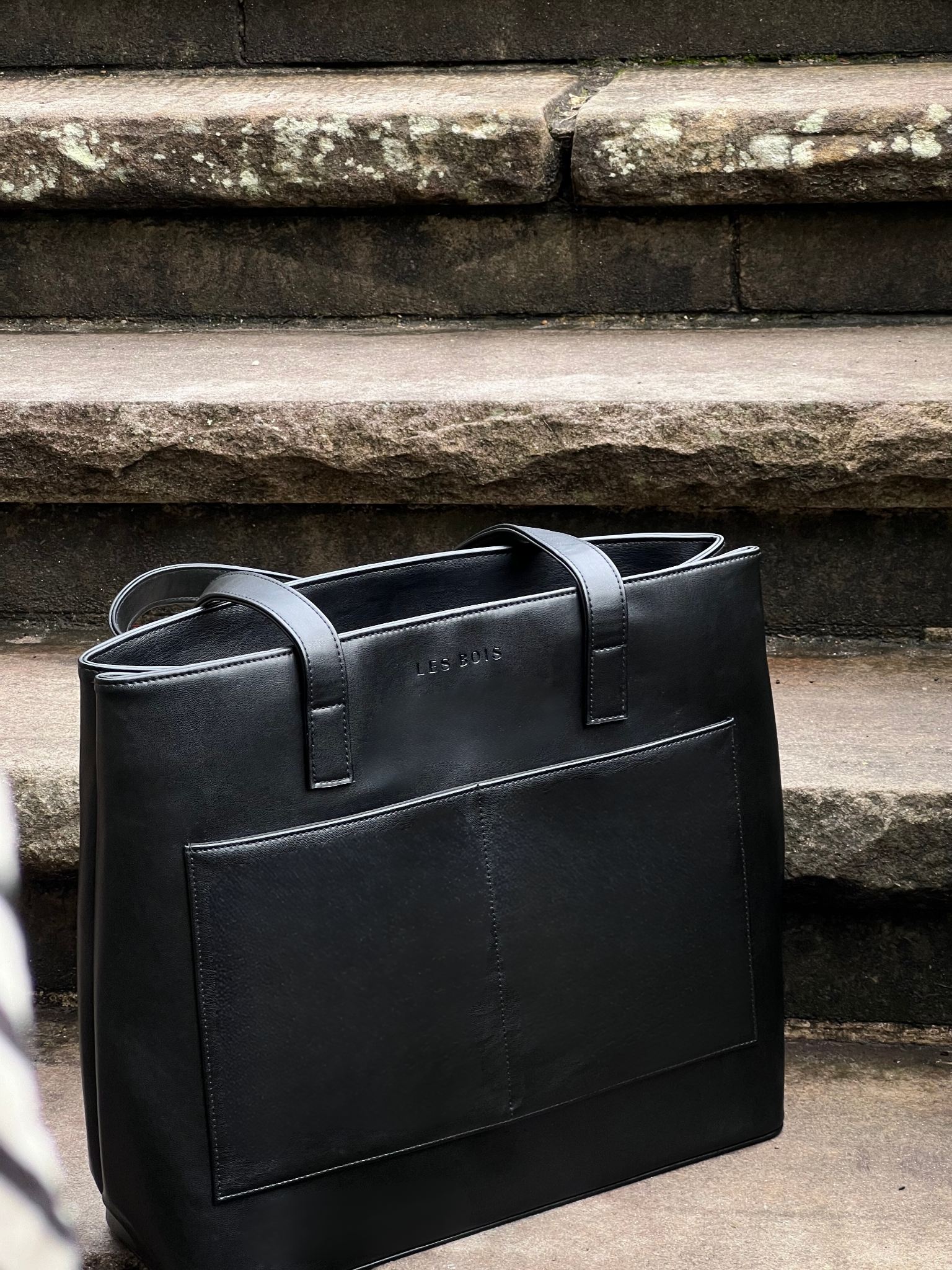 Waterproof vegan leather tote bag with organised interior, ideal for professionals on the go